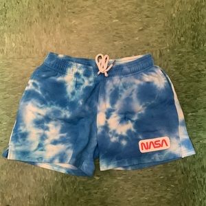 Blue tie-dye NASA drawstring shorts in the same condition as bought
